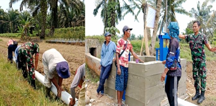 Babinsa Koramil Tais dan warga Desa Purbosari gotong royong pasang pipa irigasi sawah